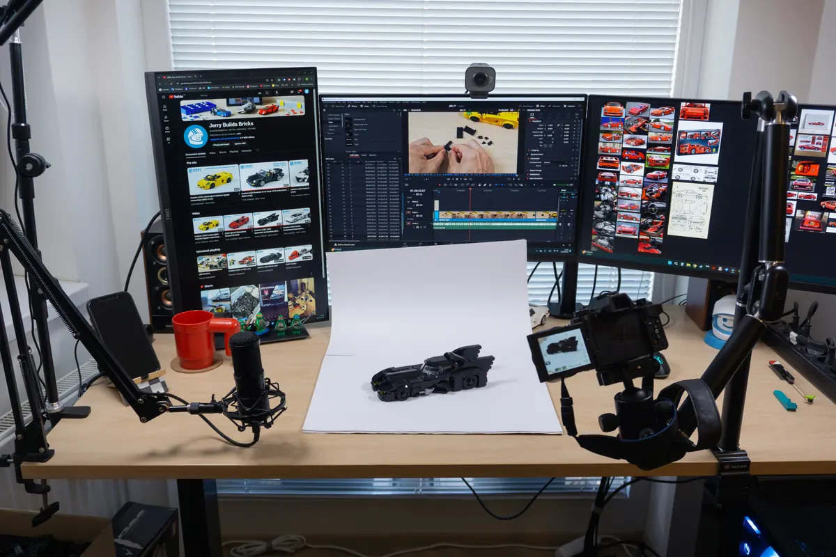 Jerry's filming setup with a camera pointed at a LEGO Batmobile on a white backdrop