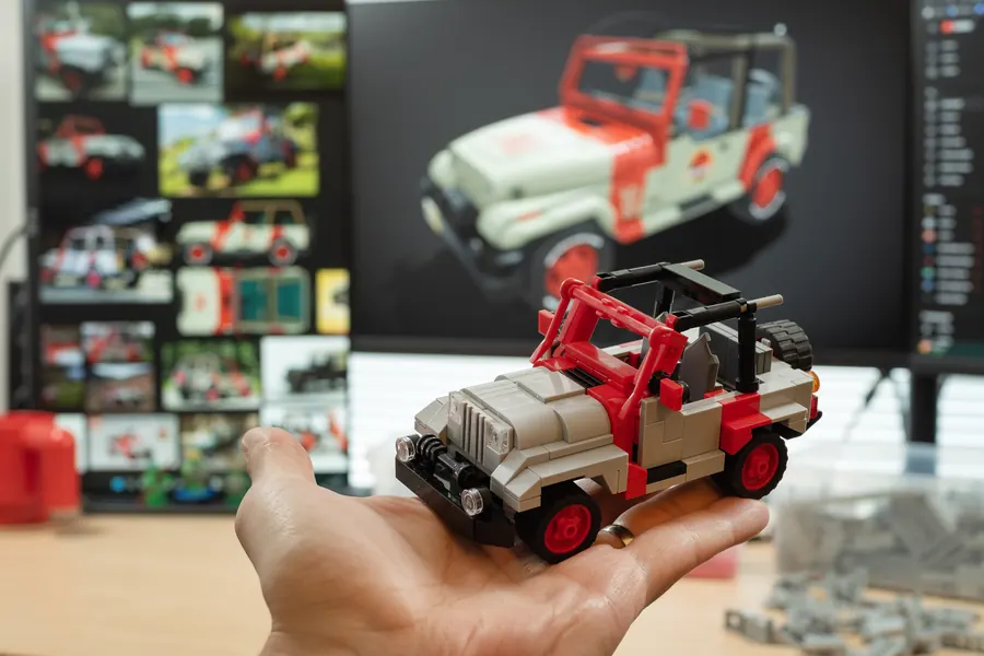 Custom LEGO Jeep Wrangler build held in hand